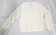 White long-sleeve shirt on a light gray background