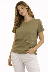 Woman wearing an olive green t-shirt with a pocket on a white background