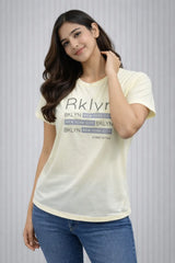 Women’s Light Yellow “BKLYN” Graphic T-Shirt - ASTRON